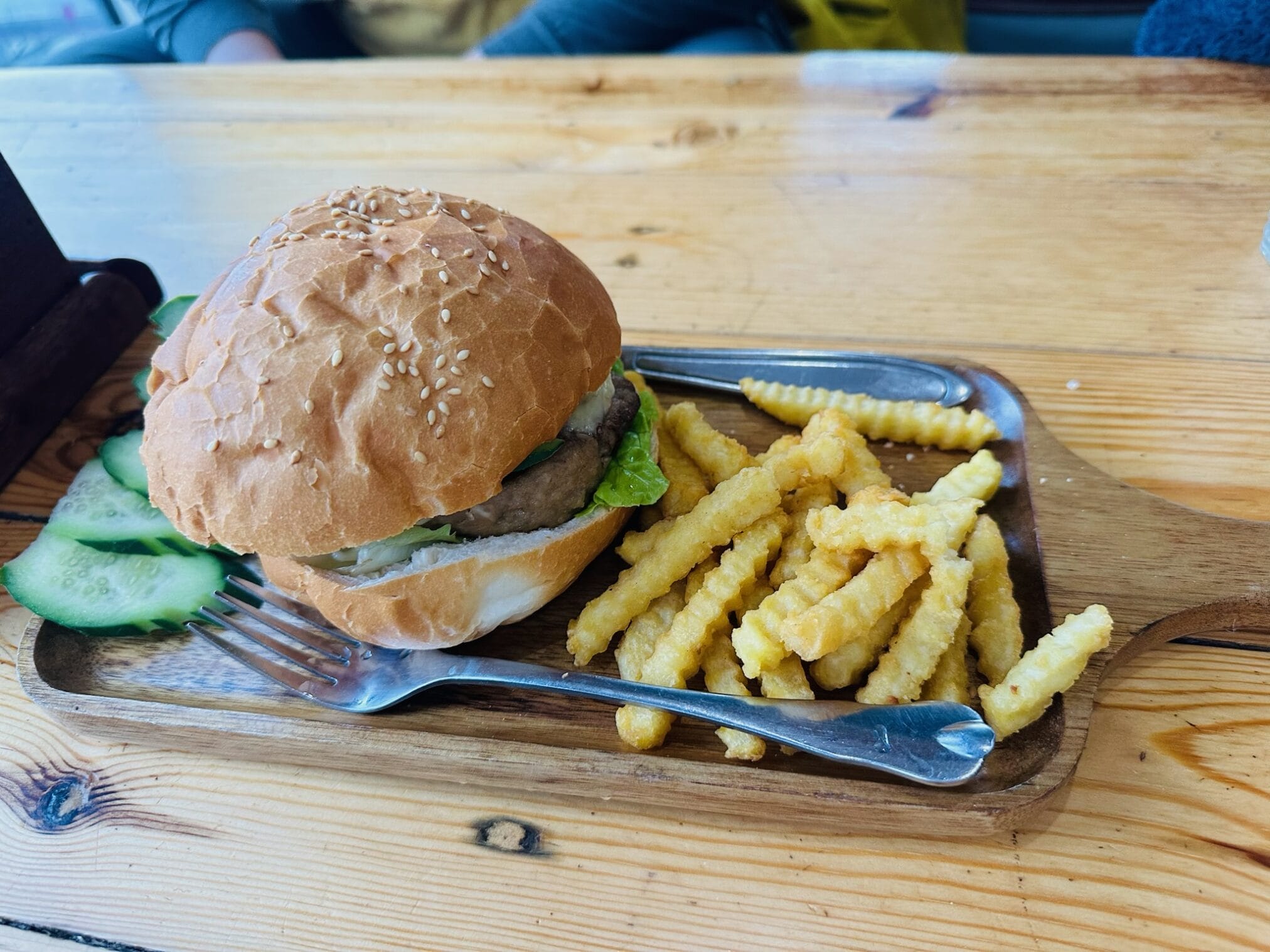 Stack of homemade pancakes with dripping syrup, perfect for breakfast